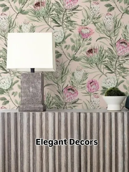 This wallpaper features a subtle protea flower pattern, which pairs beautifully with the fluted console table. It shows how the right wallpaper can complete the look of your furniture and decor.