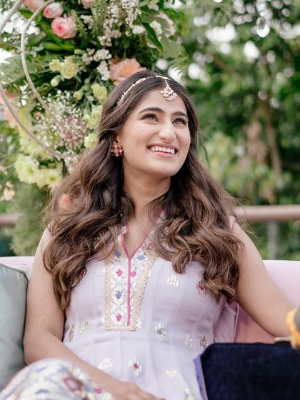 For an intimate mehendi with a color-coordinated theme, we chose this lovely Gopi Vaid sharara set. The pastel lavender and minimal accessories kept the vibe youthful, fresh, and playful.