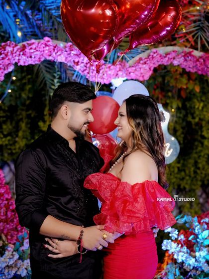 A romantic portrait with balloons and beautiful decor, capturing the celebratory mood right after the proposal.