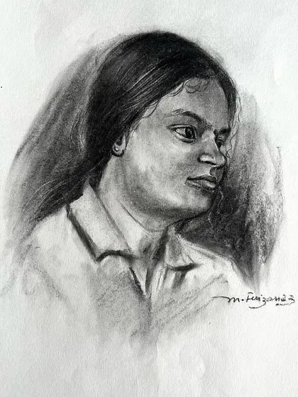 This charcoal portrait of a woman was about capturing a soft, gentle expression. I used smoother blending techniques to create the soft skin tones and the texture of her hair.