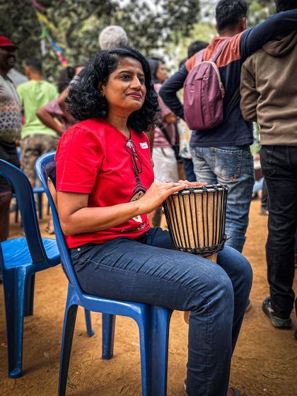A member of our community enjoying the drum circle at the Garage Sale. The energy is infectious.