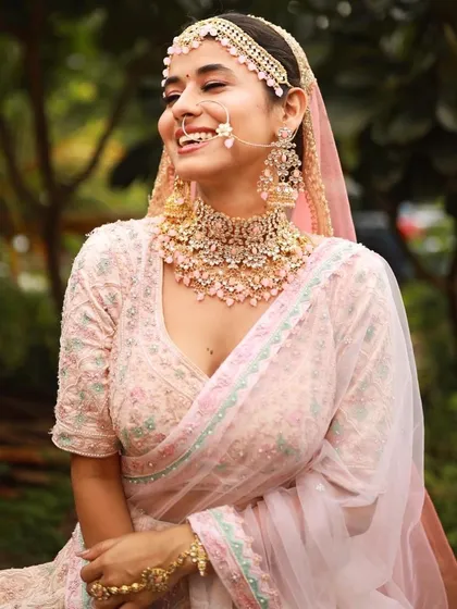 The bride's joyful laugh is infectious. The makeup is designed to be light and comfortable, allowing her to be herself on her big day.