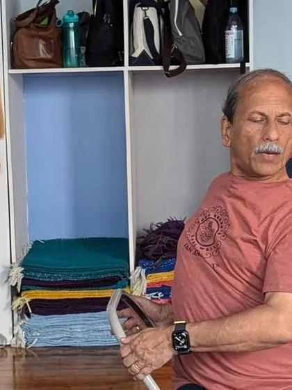 A seated twist using the back of a chair.