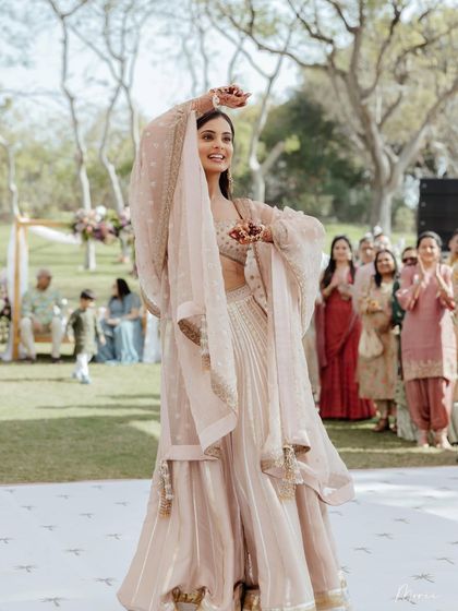 The bride enjoying her dance performance. The entire look is designed for comfort and style.