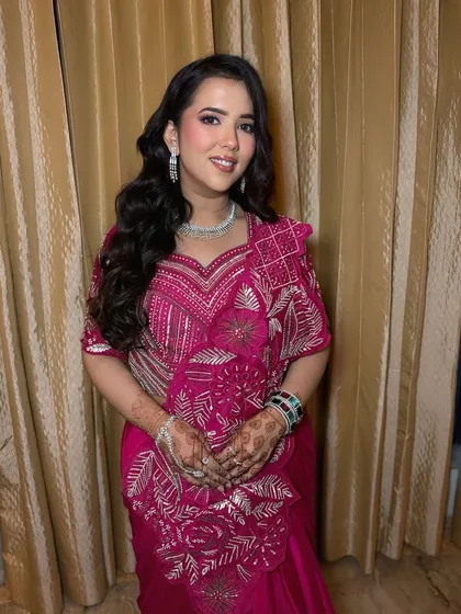 A portrait of the bride-to-be at her Roka. The soft waves and glowing makeup create a look that is both elegant and celebratory.
