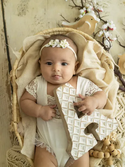 A curious and alert expression. This 3-month-old was fascinated by the studio and her special setup.