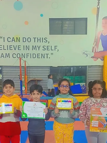 A group of our students proudly displaying their various certificates of achievement.