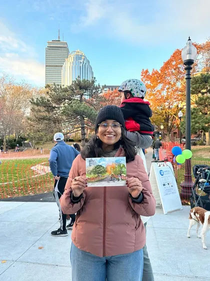A happy moment with a little one who joined me for a photo with my painting in Titus Sparrow Park.