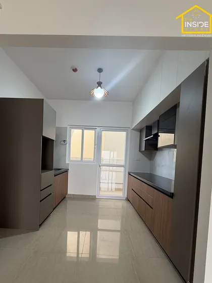A wide view of a galley kitchen layout, demonstrating how we maximize counter space and storage in a compact footprint.
