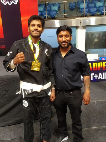 With my supporter after securing the gold medal at the SJJIF India Open. Having a strong corner makes all the difference in a tough competition.