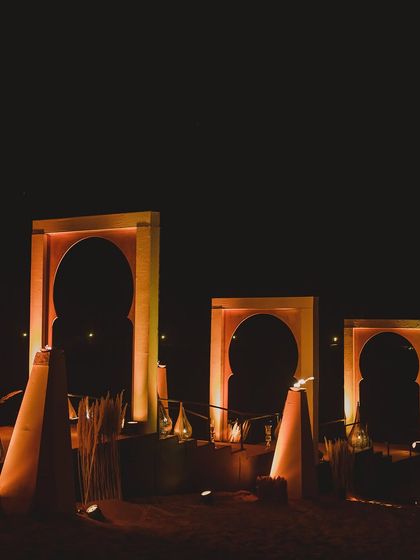 Minimalist, elegant decor featuring Moroccan-style arches. Over 7 years, we've learned that sometimes the simplest designs can have the most profound impact.