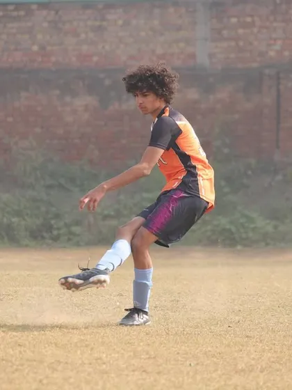 A player taking a free kick during the Gurgaon Winter Cup.