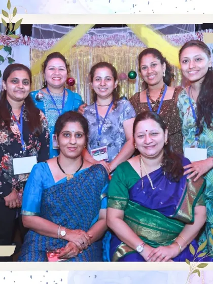 A group of teachers and parents taking a moment to get a lovely group portrait at the photobooth.