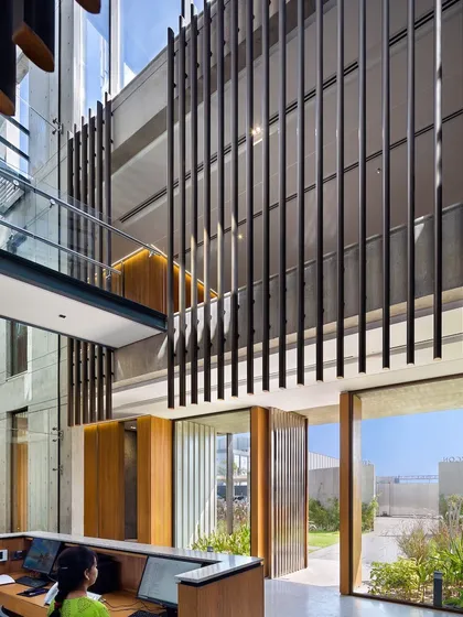 In the Laxcon office, we used derivations of the company's own stainless steel for partitions, handles, and cladding, celebrating the client's core product within their own workspace.