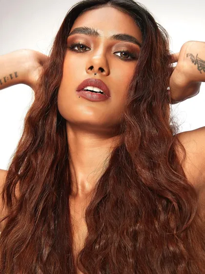 A fresh and bronzy glam look from a student's first portfolio shoot. This warm, glowing makeup is perfect for any special occasion.