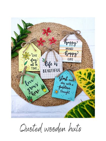 A collection of our quoted wooden huts, perfect for adding a touch of inspiration to your home. These little handmade creations are made with love and are priced under ₹500.