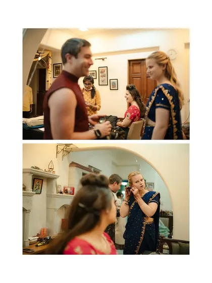 Getting ready for an Indian wedding is a family affair. Here, guests from abroad get help with their sarees and jewelry.