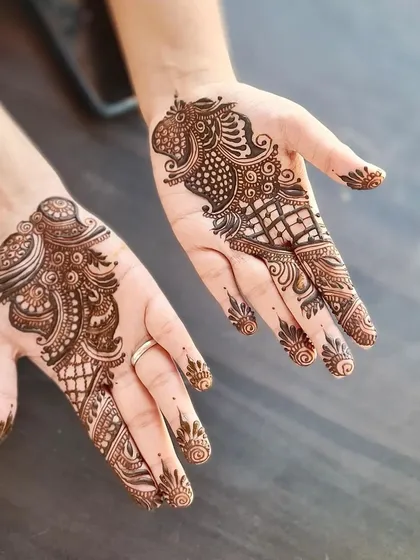 This design features a modern take on the traditional peacock, with abstract shapes and patterns for a unique look.