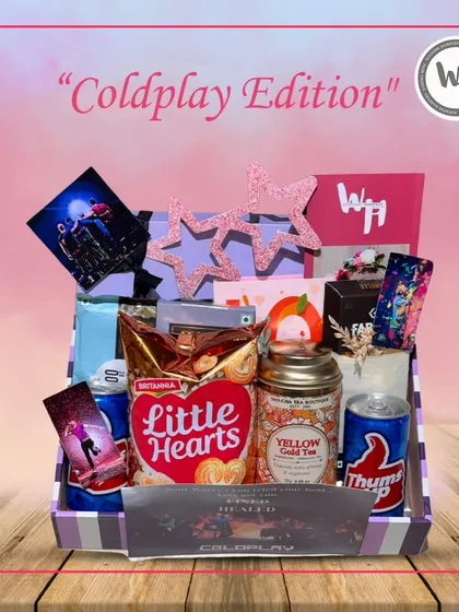 A close-up of the Coldplay hamper, showing the "Yellow Gold Tea" and other themed items that make this gift so special for a fan.