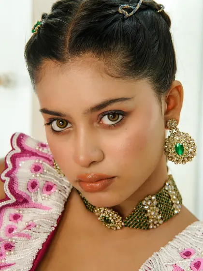 A close-up of a finished glam look, focusing on flawless skin, defined eyes, and perfectly blended tones. In my masterclass, we dive deep into the techniques required to achieve this level of professional, photo-ready makeup.