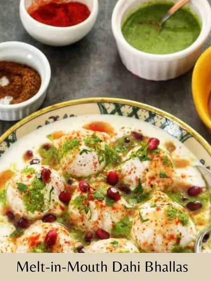 Our Dahi Bhallas are melt-in-your-mouth soft, soaked in creamy yogurt and topped with tangy chutneys and spices. They are a perfect, refreshing snack for any party or a light treat for yourself.