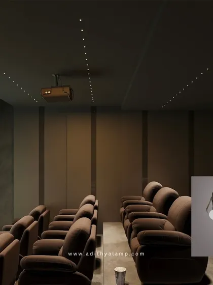 Another view of a home theater, this time showing a different model of our small recessed lights. These fixtures offer a slightly wider beam, providing gentle ambient light that is ideal for navigating the room when the main lights are off.