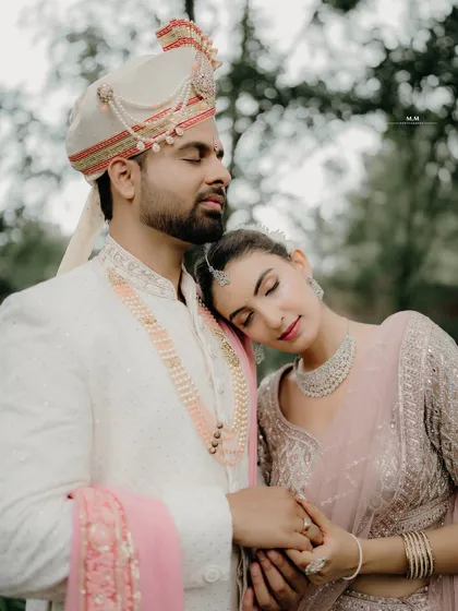 A moment of serene love. This shot captures the quiet trust and affection between the couple, a beautiful memory from their pre-wedding photography session.