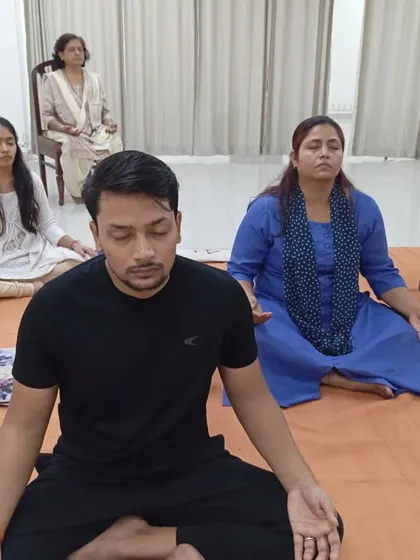 People of all ages come to sit in this space. Here, a diverse group of seekers meditates together, each on their own journey but supported by the community.