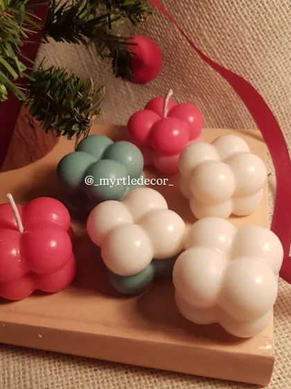We love how playful these Bubble Candles are. Poured in festive colors like red, green, and white, these soy wax candles add a modern and fun touch to your Christmas decor. They look just as lovely unlit on a shelf as they do when glowing.