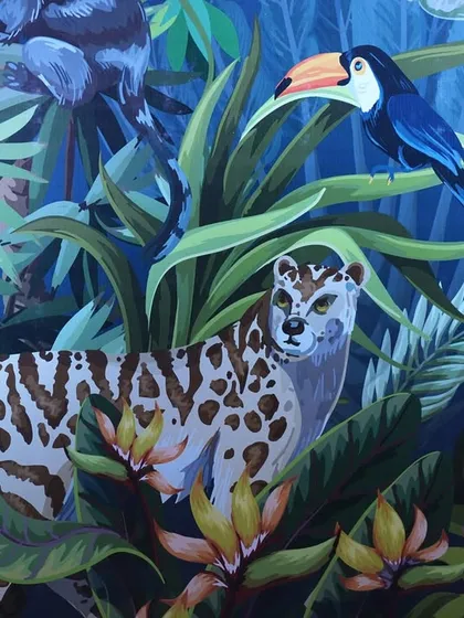 A close-up of the custom-designed jungle wallpaper, showing the incredible detail of the artwork featuring a snow leopard, a toucan, and a zebra. This highlights my commitment to creating unique, high-quality design elements.