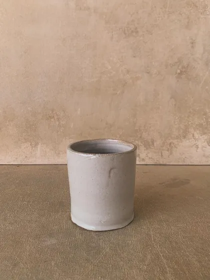 A simple, elegant white glazed cup. Sometimes less is more.