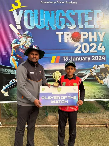 A proud moment for Keshav Kapuria as he receives the Player of the Match award after the tournament's opening game.