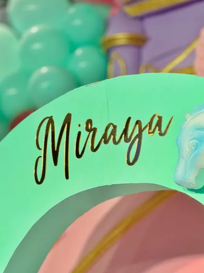 From a pastel soft play area and a cotton candy cart to a buffet with an LED screen backdrop showing aquatic life, every element was designed to immerse guests in Miraya's mermaid world.