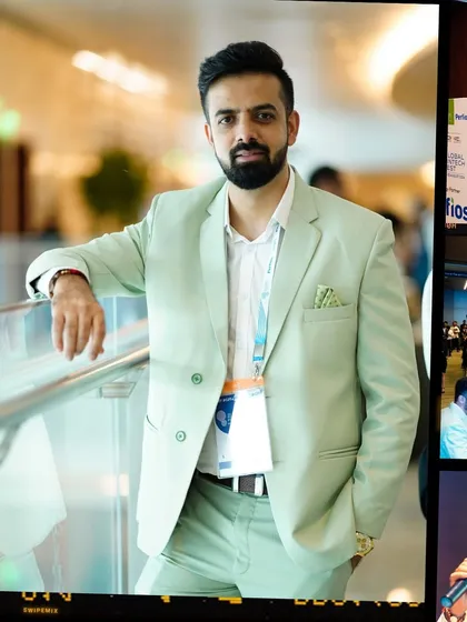 A professional shot of me at the Global Fintech Fest, ready for the day's sessions.
