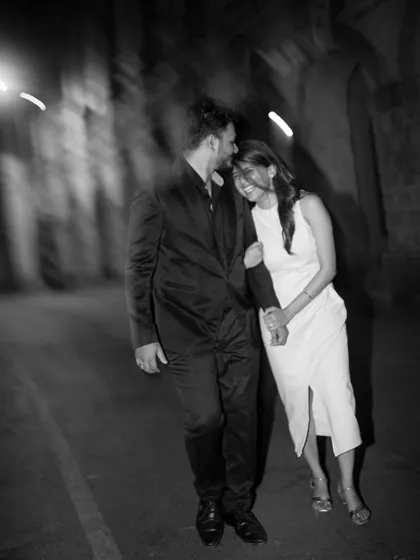 A blurry, candid black and white shot that perfectly captures the feeling of a happy, fleeting moment.