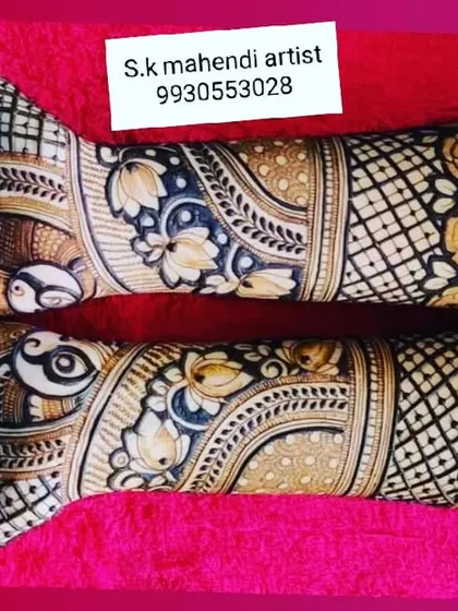 A beautiful design with peacock and floral motifs laid out horizontally. The use of color and shading gives this design a unique, painted look.