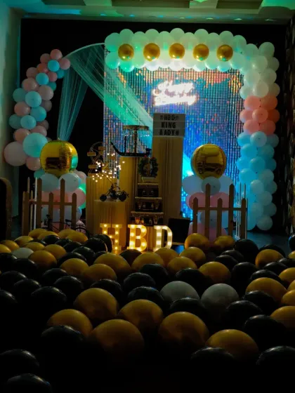 In dimmer lighting, the neon sign and light-up letters become the main focus. This creates a fantastic atmosphere for cake cutting and photos during your event.