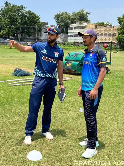 Training is a partnership. Here, I am on the field with an athlete, discussing strategy and technique. Clear communication is key to ensuring you understand the 'why' behind every drill we do.
