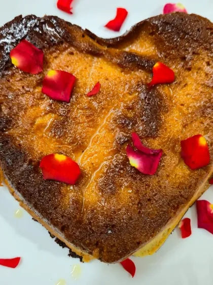 We pour our heart into our work, and this heart-shaped Chhenapoda is proof. Garnished with fresh rose petals, this baked cheese delicacy is a unique and thoughtful gift for anniversaries, birthdays, or simply to show someone you care.