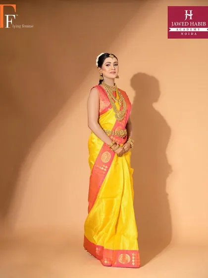 A full length view of the South Indian bride, showcasing the complete look from head to toe.