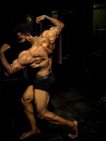 "Zindagi m kabhi bhi haar mat manna" (Never accept defeat in life). A dramatic shot of my athlete's physique, embodying the spirit of relentless hard work.