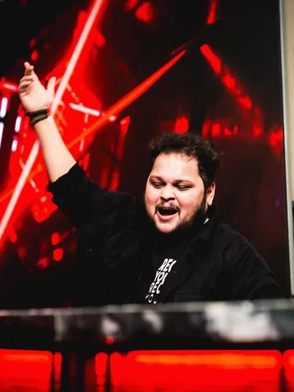 Dropping beats like it's hot. A shot of me in the middle of an intense moment, fully engaged with the music and the crowd.