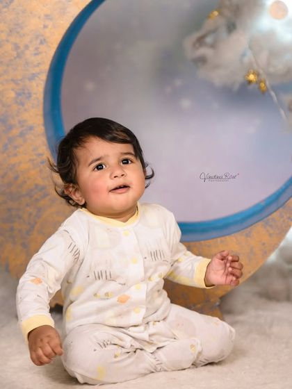 A cozy pajama-themed shoot on our moon set. The soft lighting and cloud props make it the perfect backdrop for capturing sleepy, angelic moments.
