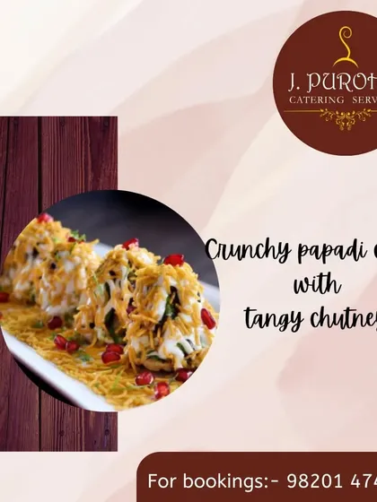 This is my version of Papdi Chaat, with crunchy flour crisps topped with potatoes, chickpeas, yogurt, and a mix of sweet and tangy chutneys. It's a delightful mix of textures and flavors.