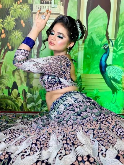 An artistic pose showing the back of the blouse and the beautiful hairstyle. Every element is carefully planned in editorial looks.