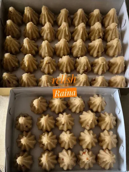 Boxes of Rava Modaks, a popular offering for Ganesh Chaturthi. They have less ghee and a very soft texture.