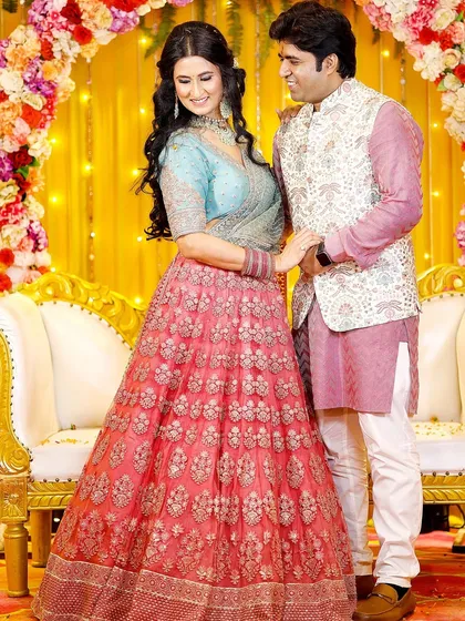 A sweet, interactive pose where the couple shares a look and a smile. These photos highlight the connection and happiness of the day.