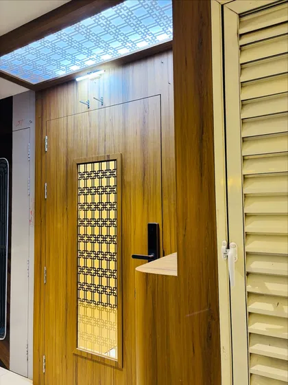Another angle highlighting the backlit panel above the door, which illuminates the entrance area.