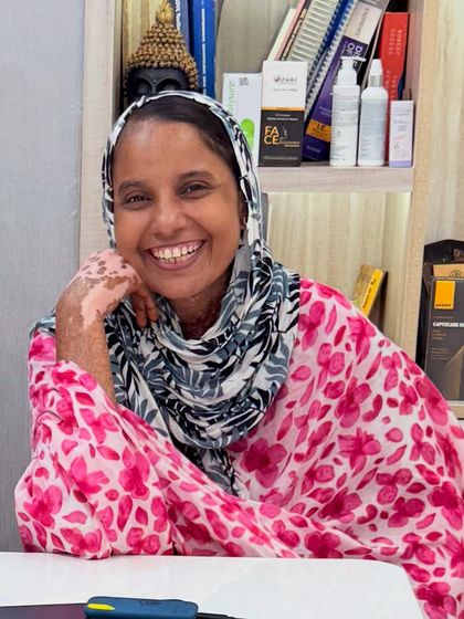 The confident smile of my patient, Nazma, after her treatment. This is the ultimate goal: to help you feel happy and comfortable in your own skin.