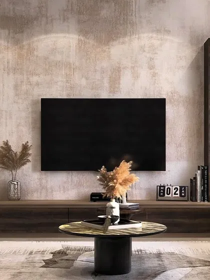 This modern TV unit combines a dark wood finish with a rustic, textured accent wall. The integrated shelving with soft lighting provides a warm glow and a place to display decor, keeping the look clean and luxurious.